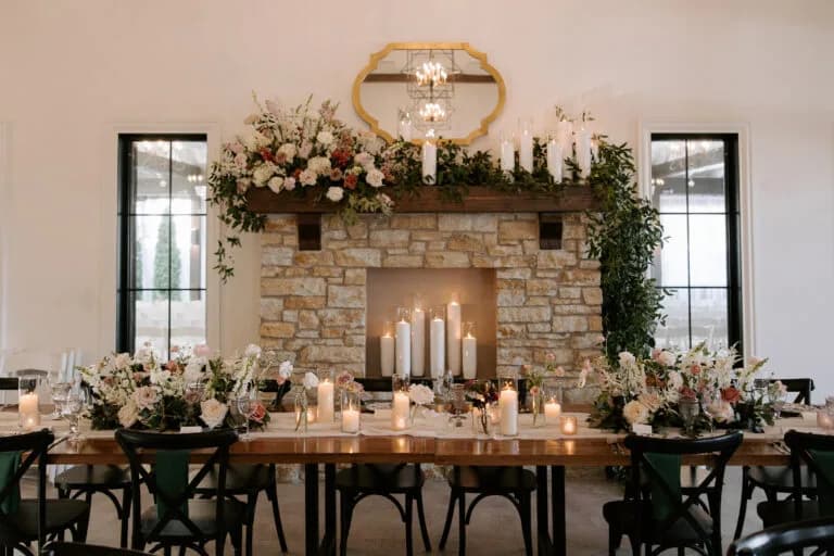 Cedar Fox wedding reception fireplace and floral decor